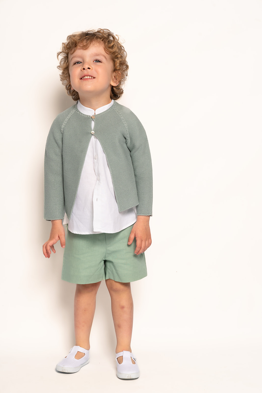 Chaqueta larga en punto perlé dos botones verde agua