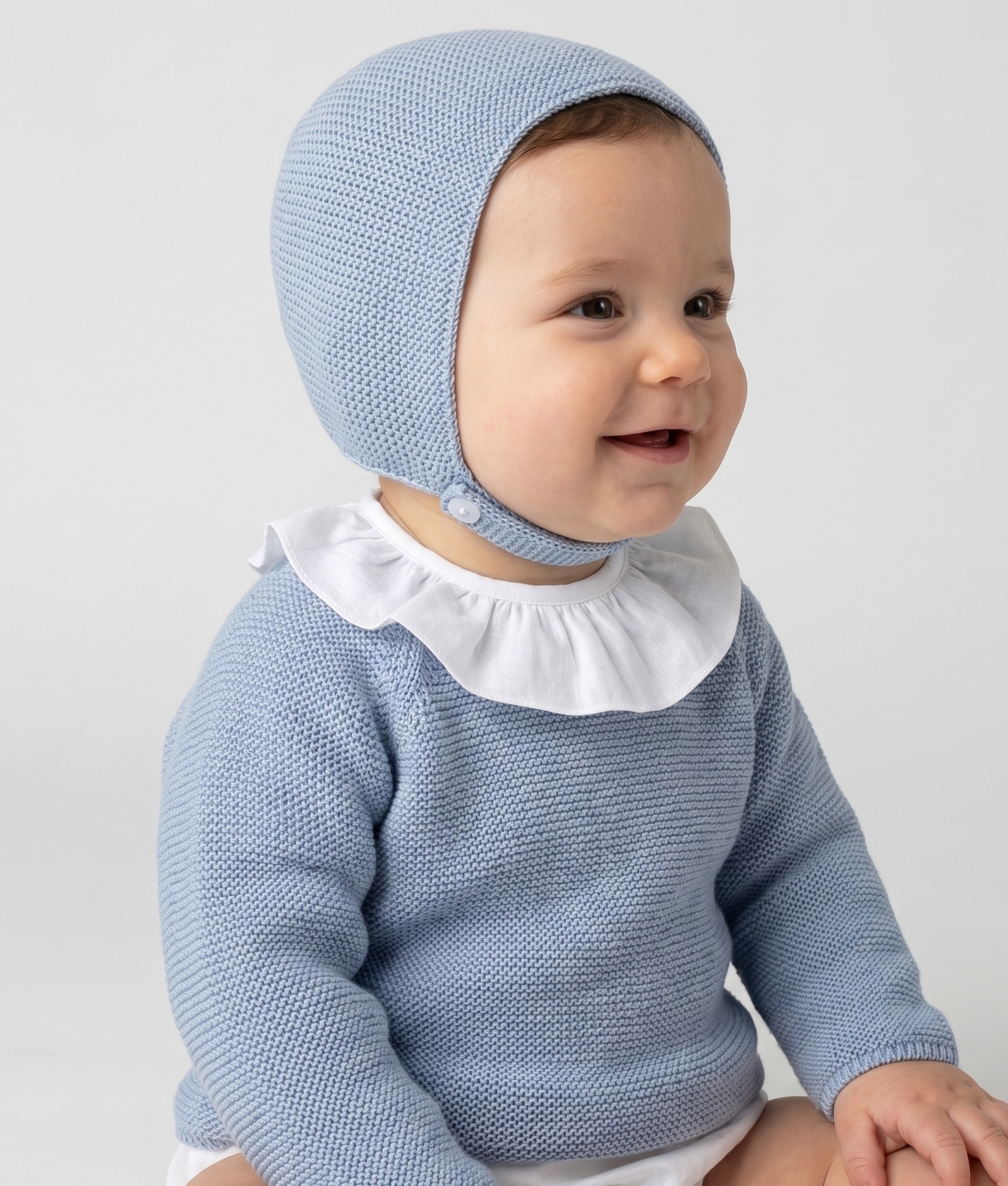 Jersey de bebé azul en punto perlé