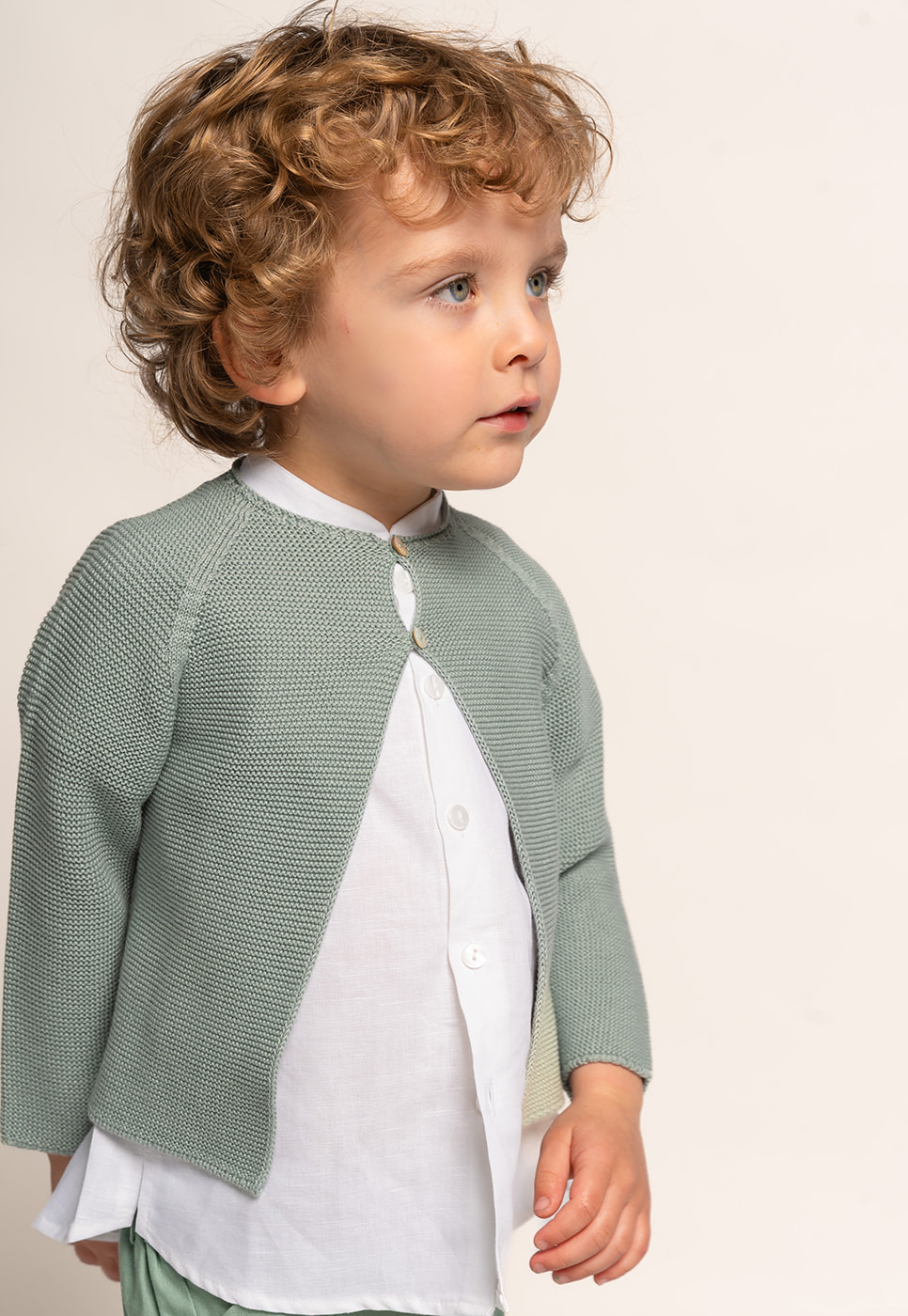 Chaqueta larga en punto perlé dos botones verde agua
